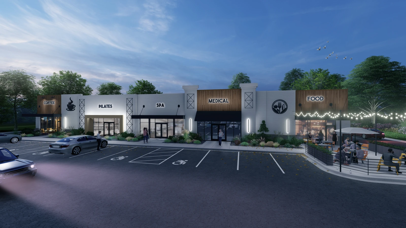 Haag Brown Development concept strip center rendering at dusk, with storefronts and outdoor dining.